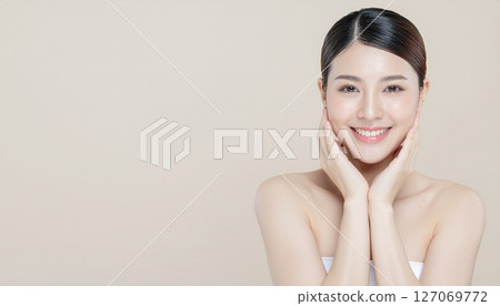 A Japanese woman in her twenties checking her skin A Japanese woman in her twenties checking her skin 127069772