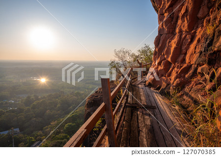 An iconic wooden stairs on Wat Phu Tok temple a quiet mountain and a place of peace and respect in Bueng Kan province of Thailand. 127070385