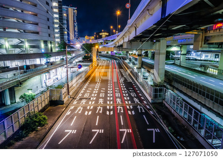 Image of a city road at night Image of a city road at night 127071050