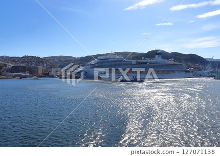 The luxury cruise ship "Adora Magic City" docked at Matsugae International Terminal in Nagasaki Port. 127071138