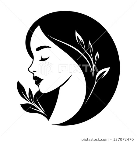 Beauty salon logo design. Beautiful young woman with makeup, long hair and natural plants, vector icon illustration Beauty salon logo design. Beautiful young woman with makeup, long hair and natural plants, vector icon illustration 127072470