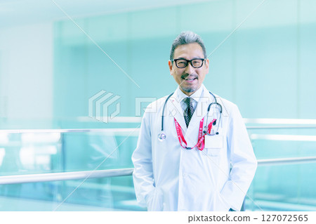 Portrait of a doctor standing in a hospital corridor Photo courtesy of Sky Perfect Tokyo Media Center 127072565
