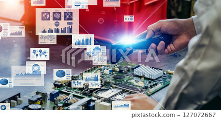 Concept of workers using handheld terminals and digital data 127072667