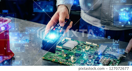 Worker using handheld terminal and digital technology concept 127072677