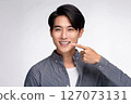 Handsome Japanese model with white teeth 127073131