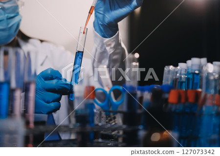 scientist working at the laboratory scientist working at the laboratory 127073342