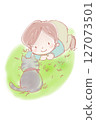 Hello♪ Do you want to play with me, cat? / A child talking to a cat on the grass 127073501