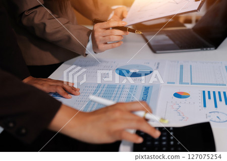 Accounting company provide finance and taxation planning for profitable cash flow, Auditor and accountant team working in office, analyze financial data and accounting record with calculator.Insight 127075254