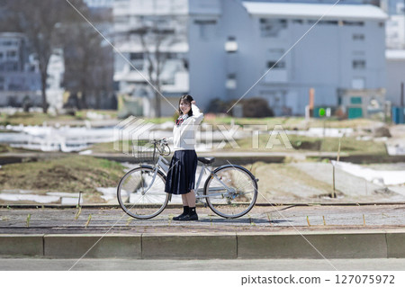 Bicycle and student Bicycle and student 127075972