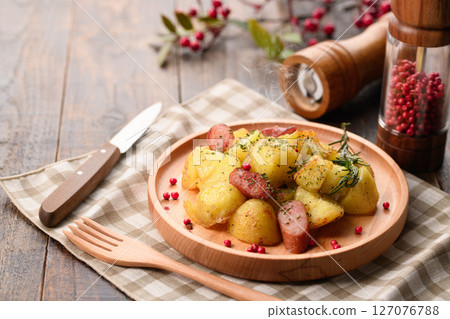 Sauteed potatoes and wieners with garlic Sauteed potatoes and wieners with garlic 127076788