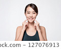 Japanese athlete with healthy white teeth 127076913