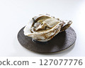 Seasonal rock oysters on a white background 127077776