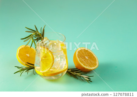 Summer cool transparent refreshing drink with ice. Summer cool transparent refreshing drink with ice. 127078811