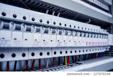 Voltage switchboard with circuit breakers. Modern electrical background. 127079199