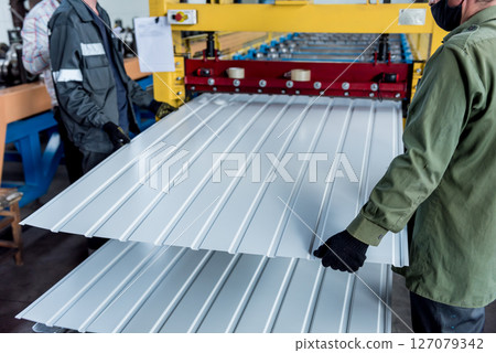Metal sheet forming machine at the modern metalwork factory. Metal sheet forming machine at the modern metalwork factory. 127079342