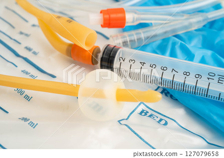 Foley catheter and urine drainage bag collect urine for disability or patient in hospital. 127079658