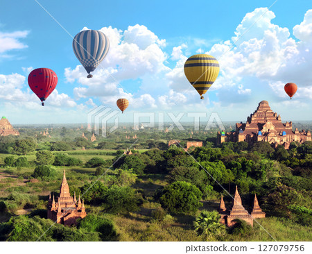 Balloon flight, famous tourist attraction of Bagan, Myanmar. Aerial view on air balloons and ancient stupas, Pagan, Burma. Topic of vacation, travel, trip abroad on vacation, cruises and tours 127079756