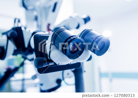 Modern microscope for operations in surgery room at the hospital. 127080313
