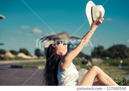 A girl relaxing in the sun 127080500