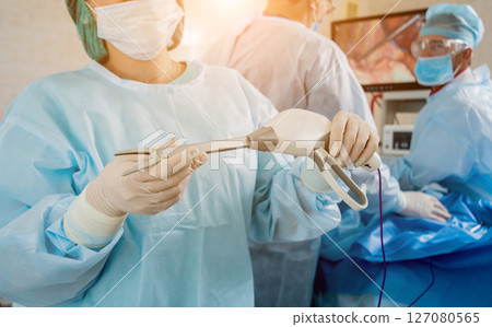Process of surgery operation using laparoscopic equipment.  127080565