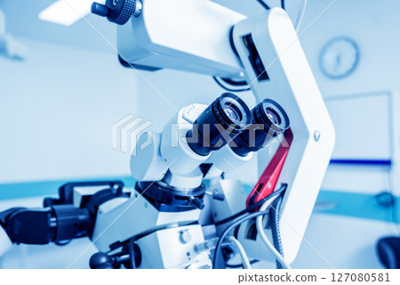 Modern microscope for operations in surgery room at the hospital. 127080581
