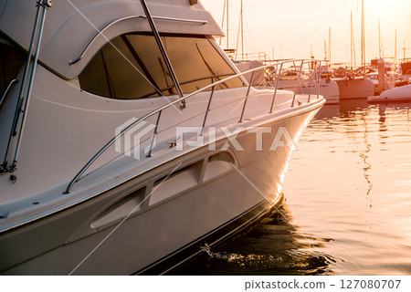 View of harbor with yachts details. Beautiful sunset sky in the marina bay. View of harbor with yachts details. Beautiful sunset sky in the marina bay. 127080707