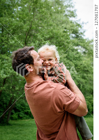 Portrait of dad and child enjoying time together 127081707