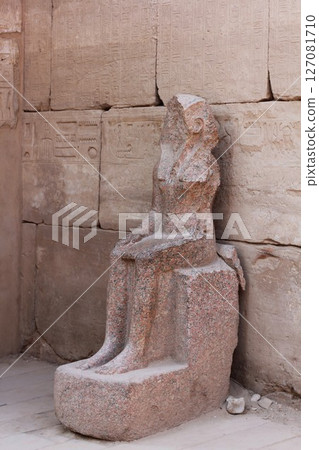 Ancient Egyptian Statue at Karnak Temple in Luxor, Egypt. Ancient Egyptian Statue at Karnak Temple in Luxor, Egypt. 127081710