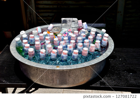 Ramune drinks sold like hotcakes on a sunny festival day Ramune drinks sold like hotcakes on a sunny festival day 127081722