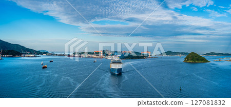 Cruise ship arriving at Nagasaki Port (Spectrum of the Seas) Panorama from Megami Ohashi Bridge [Nagasaki City] 127081832