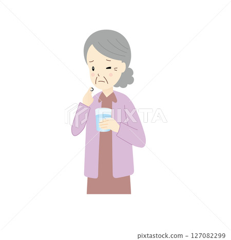Senior woman having trouble taking medicine Senior woman having trouble taking medicine 127082299