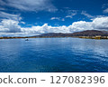 Totora boat on the Titicaca lake near Puno, Peru 127082396