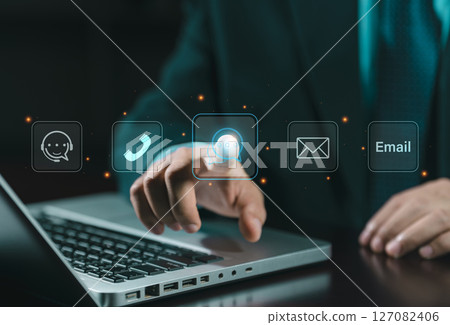 Contact us or the customer support hotline to connect. Businessman touching on virtual screen contact icons. Connecting line, email, AI chat, internet. Contact us or the customer support hotline to connect. Businessman touching on virtual screen contact icons. Connecting line, email, AI chat, internet. 127082406