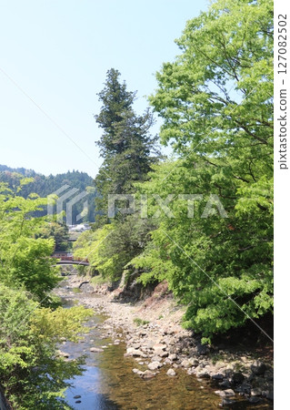 The clear stream of Muroji Temple surrounded by fresh greenery 127082502
