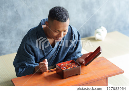 Foreign tourists eating Japanese food Foreign tourists eating Japanese food 127082964