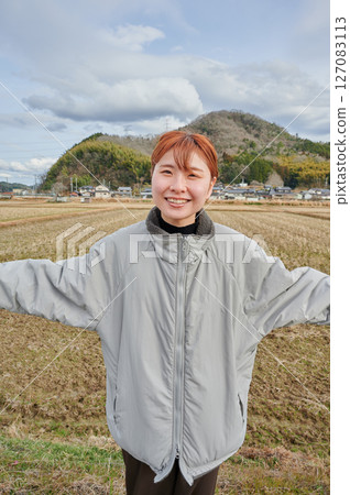 Woman gazing into the distance in nature 127083113