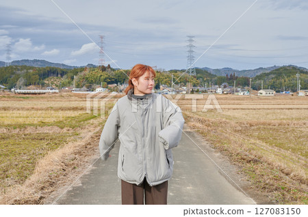 Woman gazing into the distance in nature 127083150