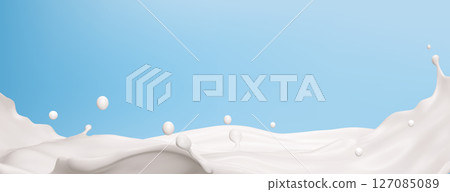 Creamy milk wave splashing on blue background 127085089