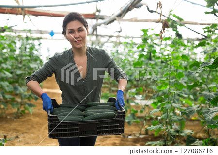 Asian farmer with boxes Asian farmer with boxes 127086716