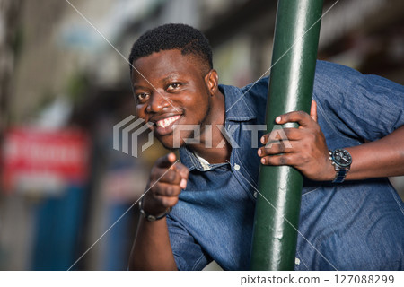 close-up of young african, smiling. close-up of young african, smiling. 127088299