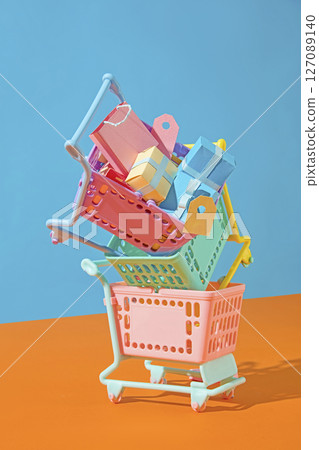 Stack-able play carts, set against a vibrant backdrop, ideal for promoting major sale events with eye-catching imagery. Symbolizing fast shipping and logistics in a cheerful composition. 127089140