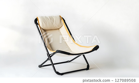 A black and white chair with a yellow stripe on it A black and white chair with a yellow stripe on it 127089508