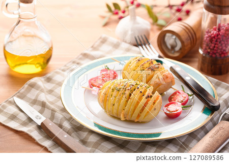 Hasselback Potatoes (Scandinavian style baked potatoes) Hasselback Potatoes (Scandinavian style baked potatoes) 127089586