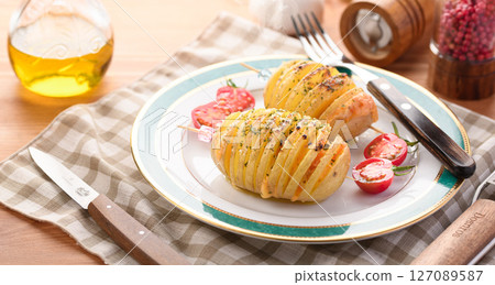 Hasselback Potatoes (Scandinavian style baked potatoes) Hasselback Potatoes (Scandinavian style baked potatoes) 127089587