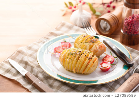 Hasselback Potatoes (Scandinavian style baked potatoes) 127089589