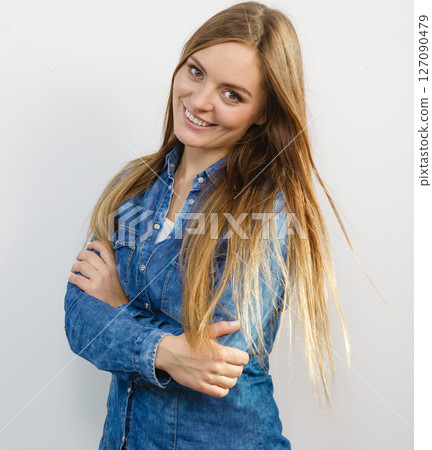 Beautiful smiling young lady. 127090479