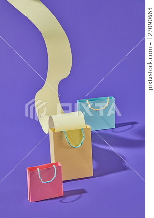 Paper-crafted shopping icons including bags and receipts decorated on purple , perfect for content related to customer journey and spending habits. Paper-crafted shopping icons including bags and receipts decorated on purple , perfect for content related to customer journey and spending habits. 127090663