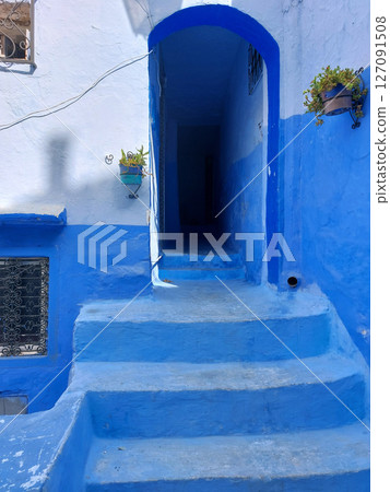 Painted blue streets, steps, doors, houses of Chefchaouen, Morocco 127091508