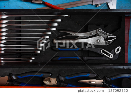 Professional work tools set for technicians in a stylish box. 127092530