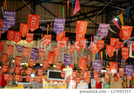 Flags at the bazaar market in Phuket, Kata, Thailand 127093557